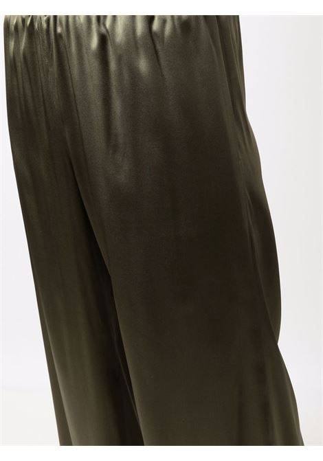 Pantaloni con finitura lucida elasticizzati in seta verde